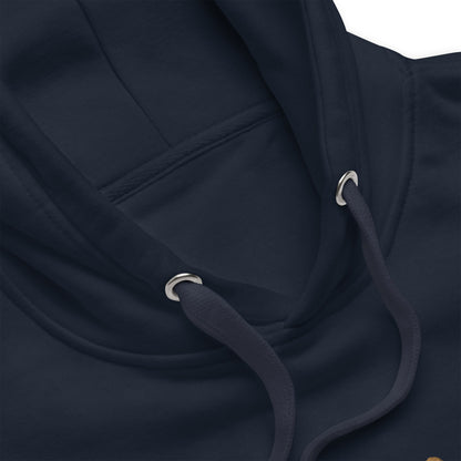 Close up of a navy blazer hoodie's string and grommet details.