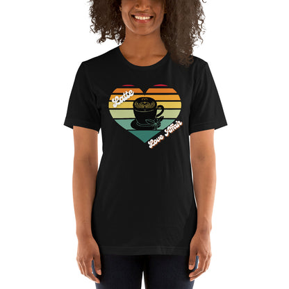 Smiling woman wearing a black coffee t-shirt that has a retro heart sunset and the words Latte Love Affair 